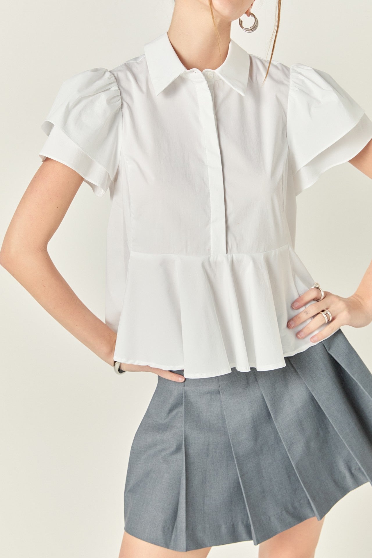 White Peplum Top